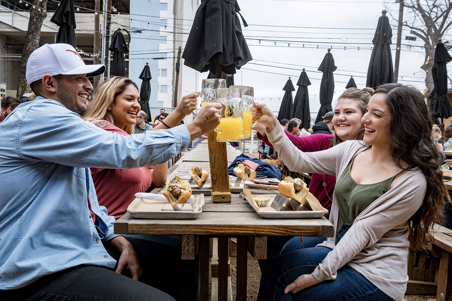 Toasting "Manmosas" at benger's Brunch in the outdoor Beer Garden on Rainey.
